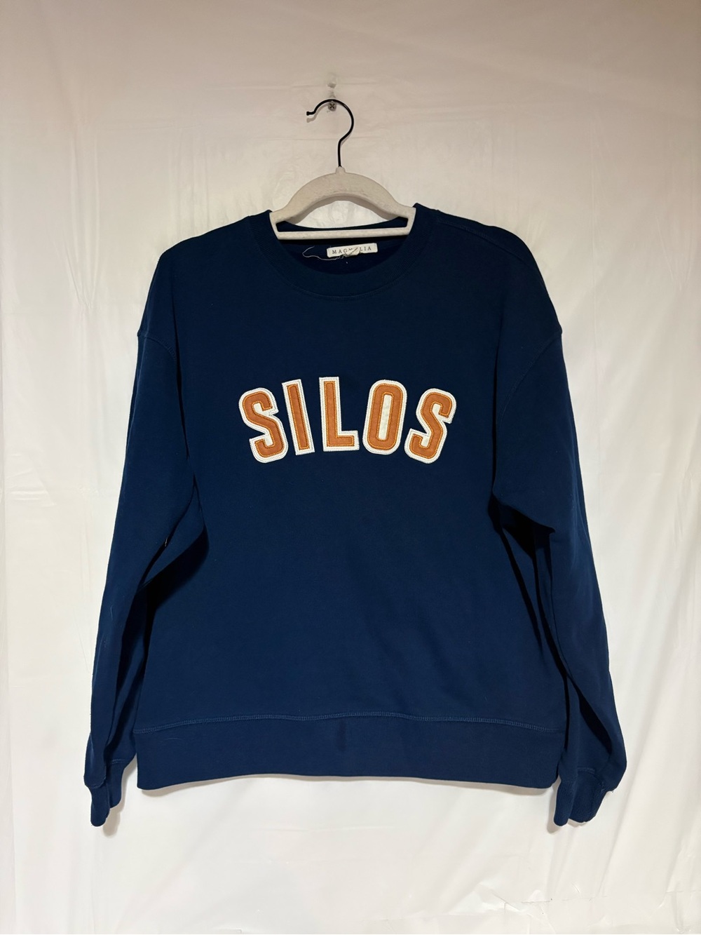 Magnolia Navy Sweatshirt with Orange 'SILOS' Appliqué